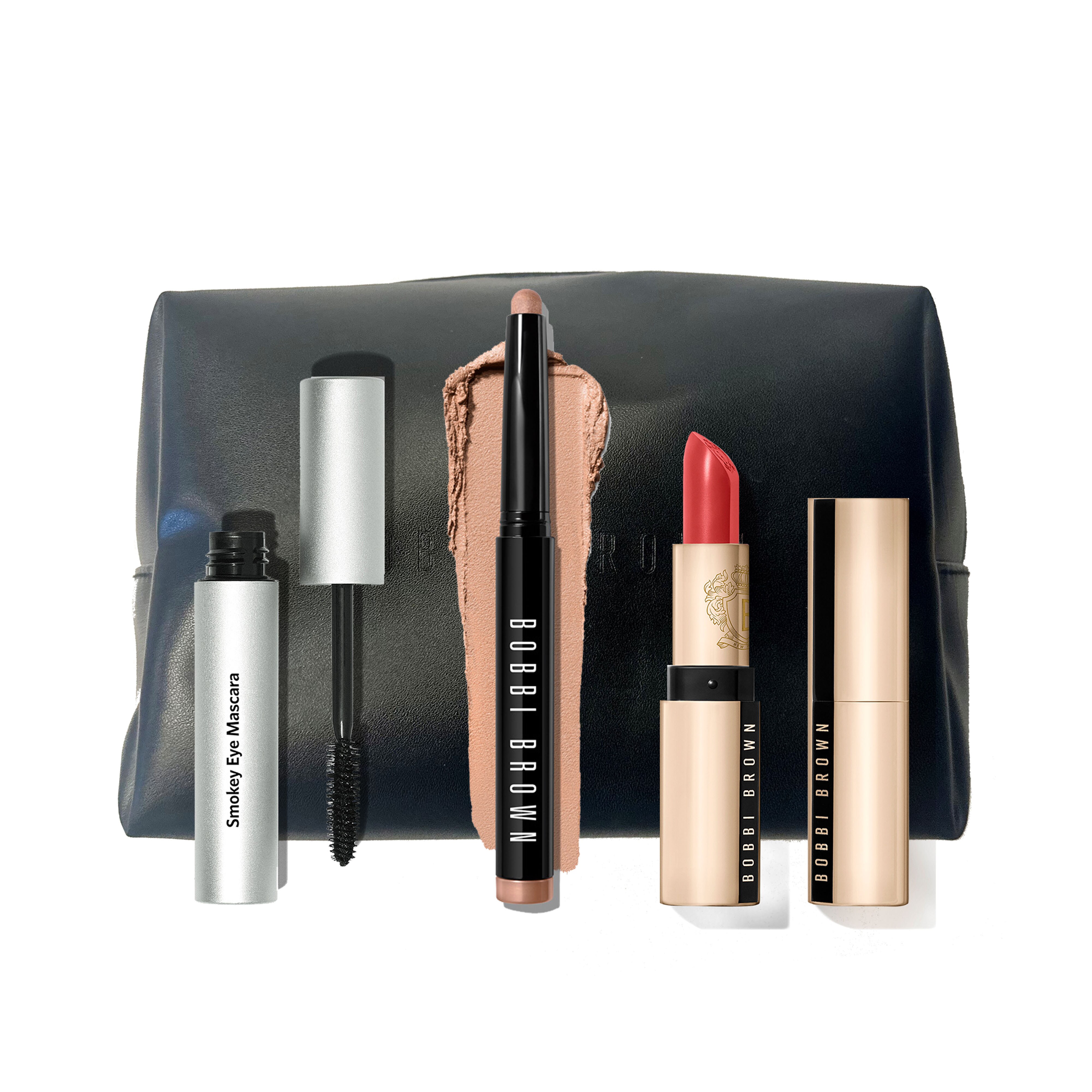 group shot of bobbi brown primer, highlighter, cream shadow stick, extra lip tint, and liquid foundation